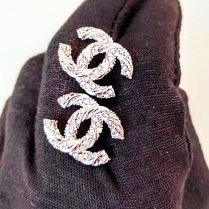 CHANEL silver stud earrings